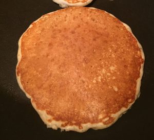 Sourdough pancake on griddle