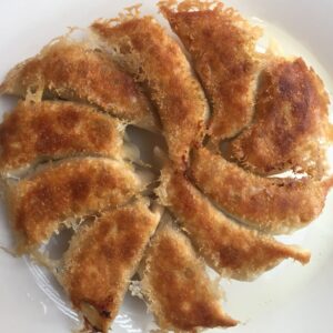 Potstickers with a crispy, lacy base and juicy filling