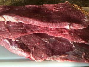 Cut along the grain of Eye of Beef Round for biltong