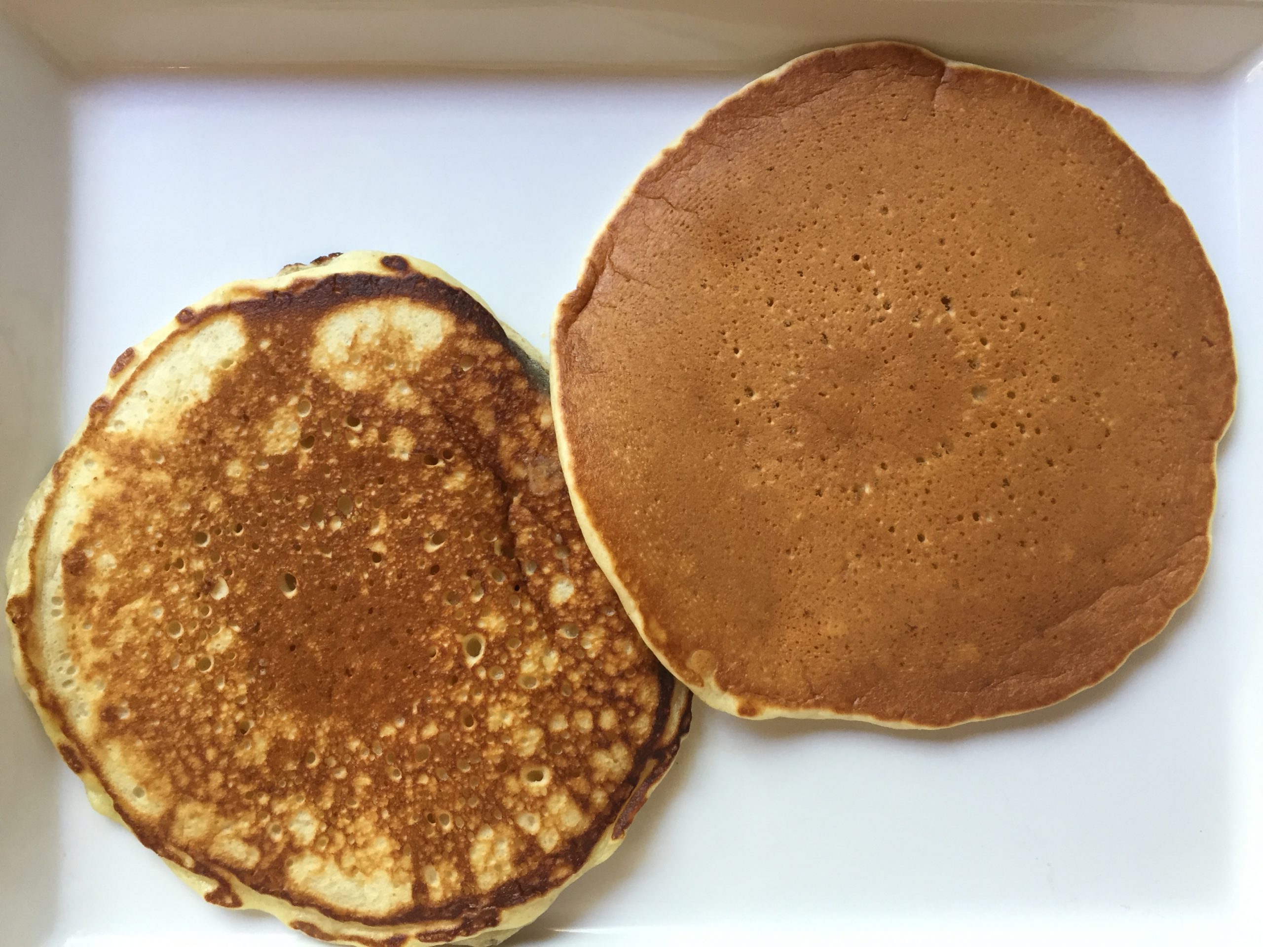 2 pancakes. 1 cooked with a lot of butter and 1 cooked without too much butter.