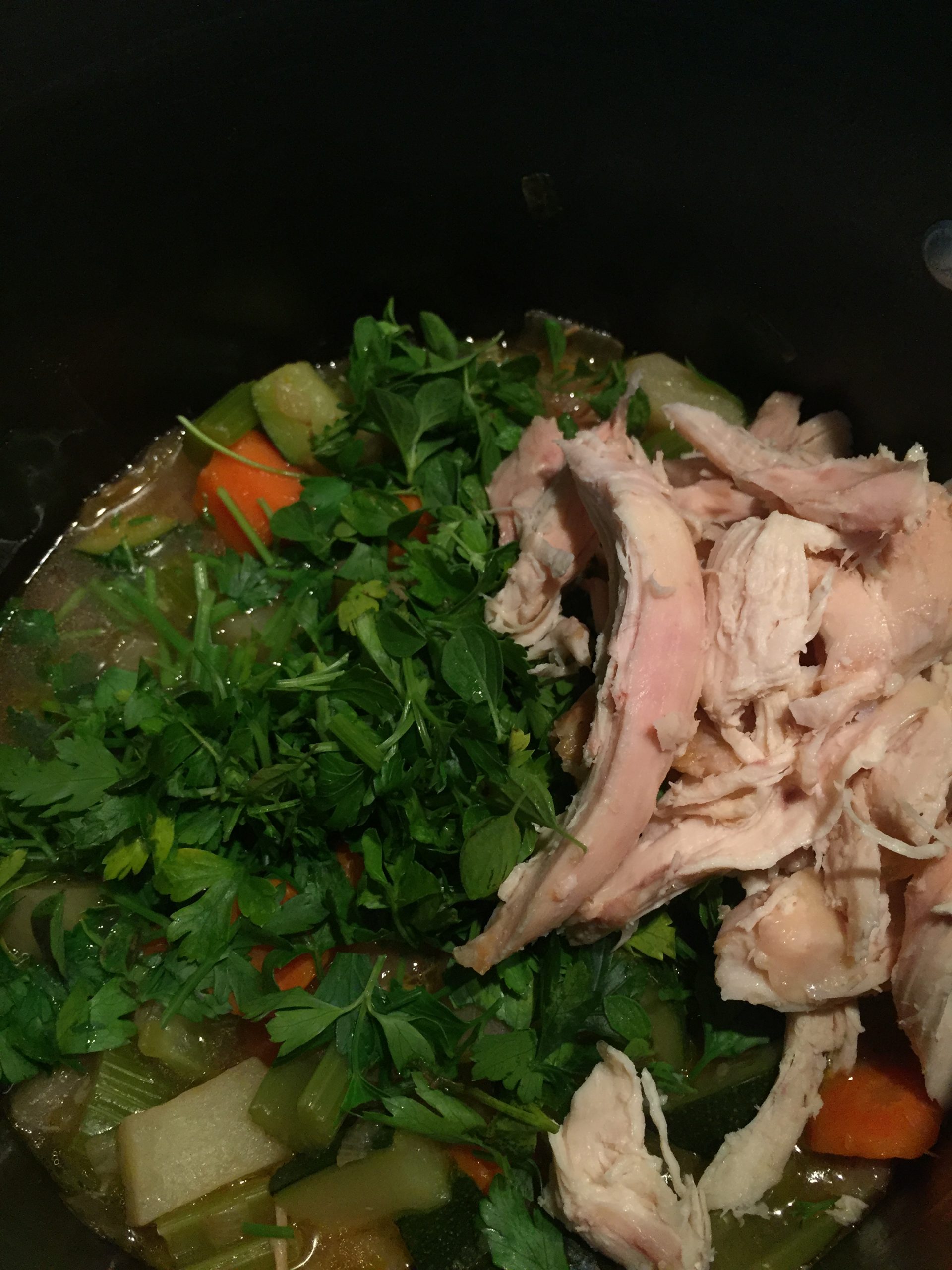Add chopped herbs to chicken and vegetable soup right before serving