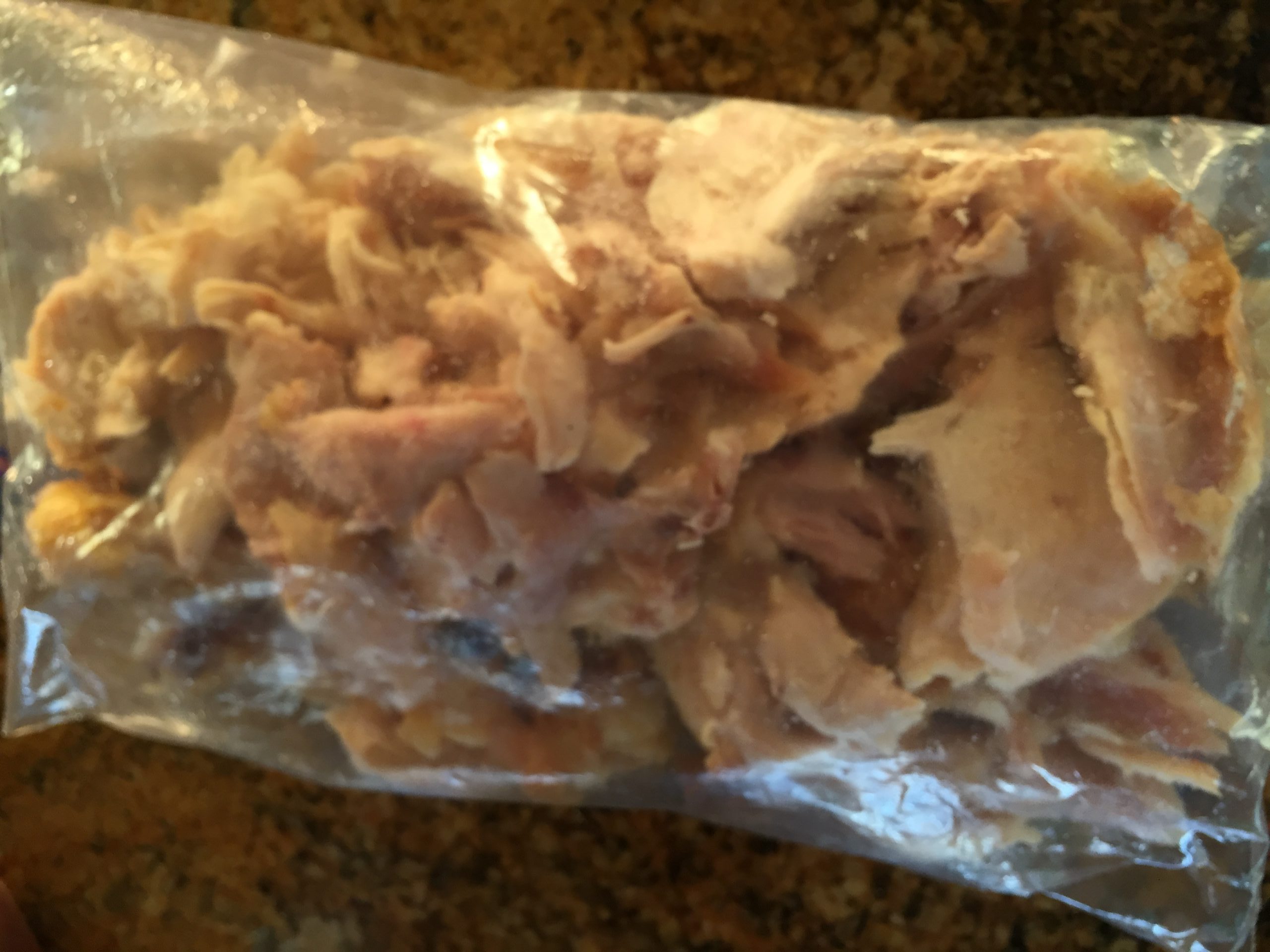 Shredded chicken in ziploc bag for freezing