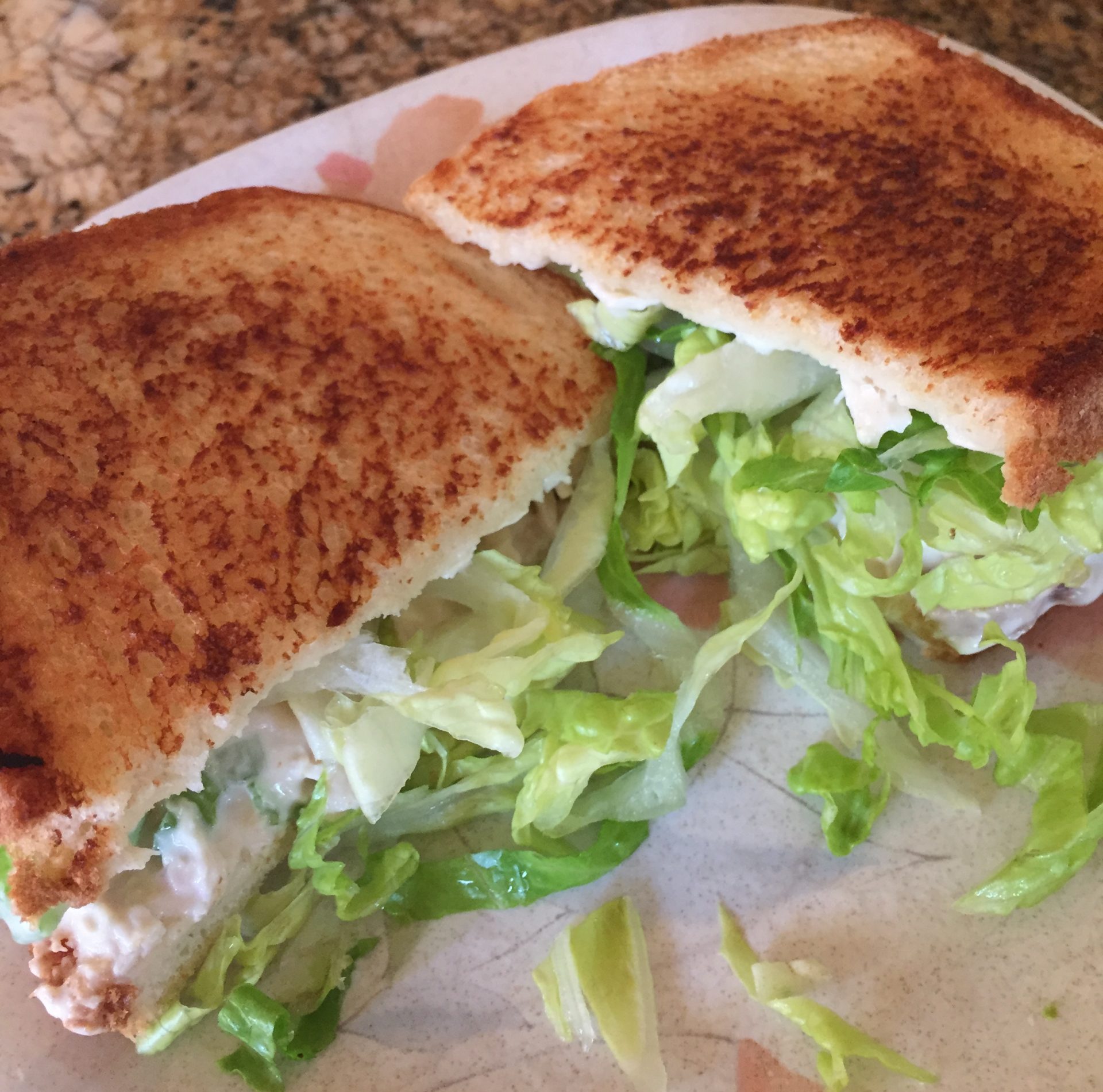 Grilled chicken salad sandwich with lettuce