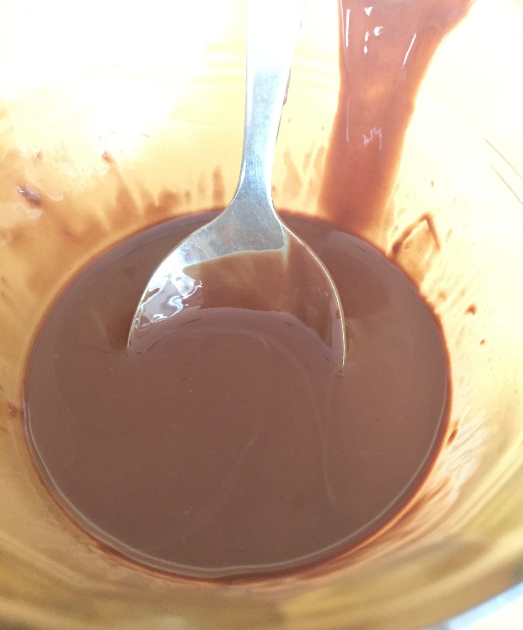 Melted chocolate with coconut oil added before microwaving