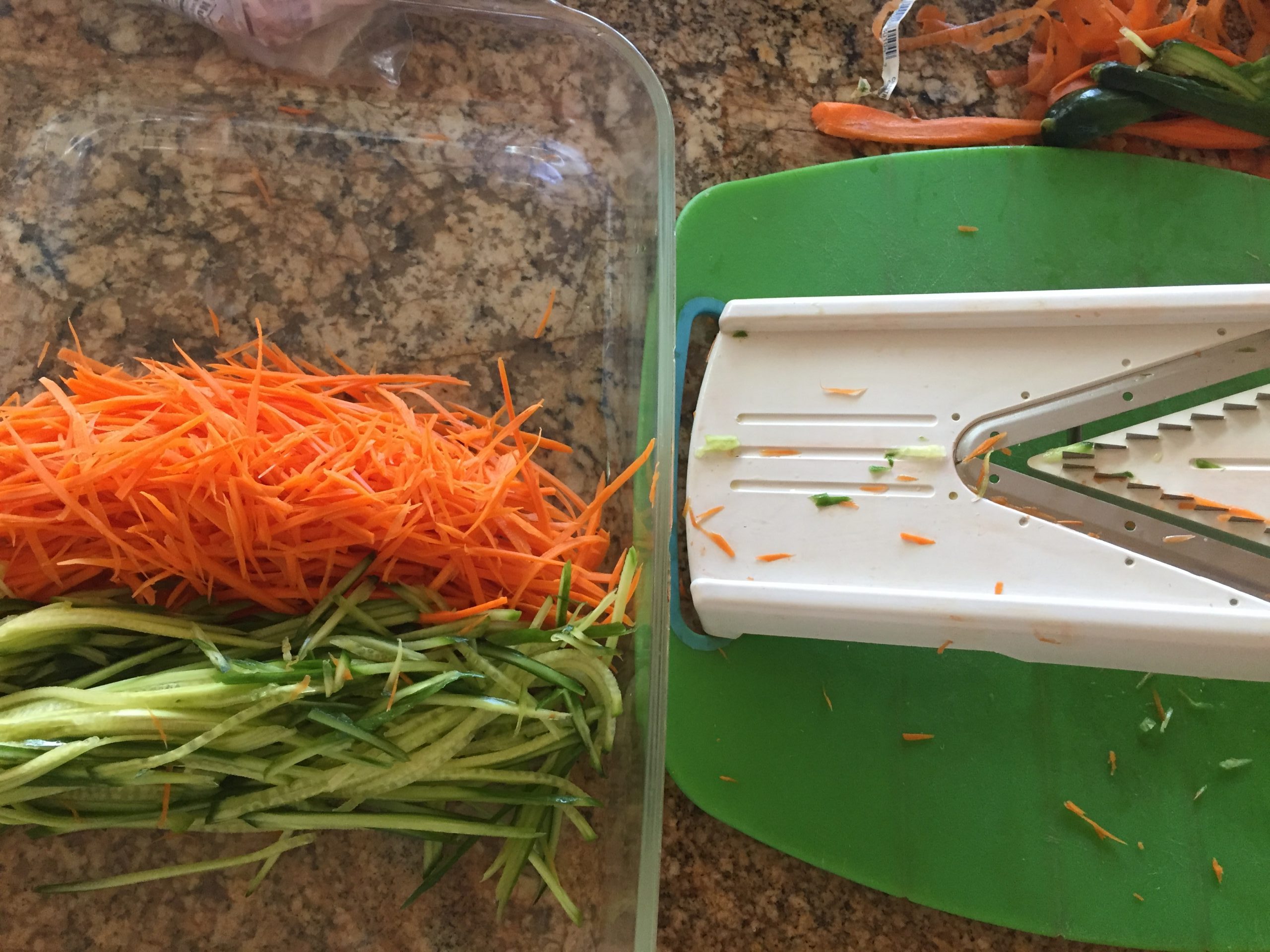 Julienne cut carrots and cucumbers for summer rolls