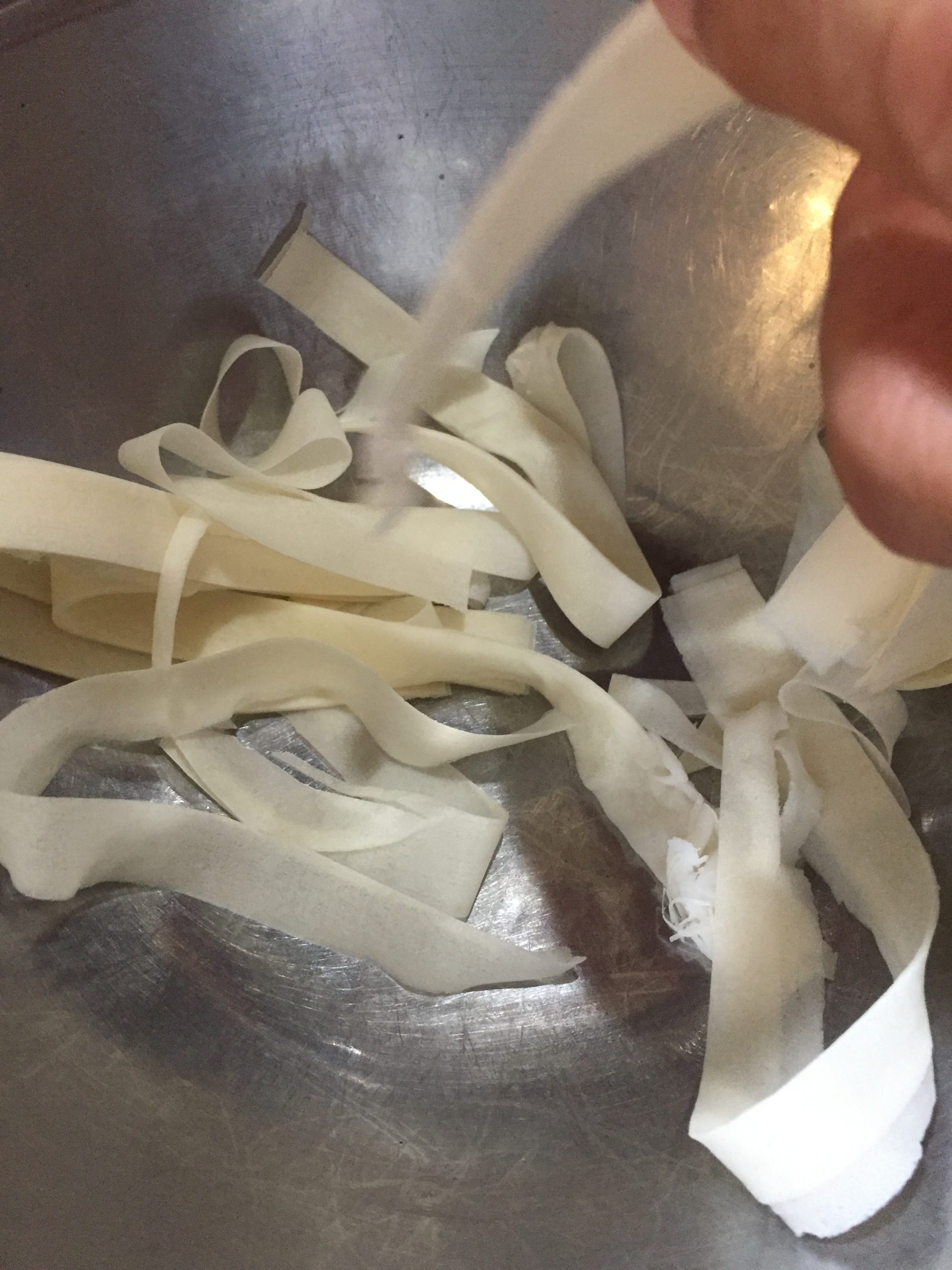 Separate spring roll wrappers before frying