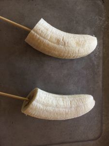 Freeze bananas with skewers