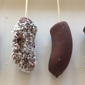 Chocolate dipped bananas with fun toppings