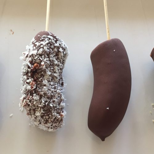 Chocolate dipped bananas with fun toppings