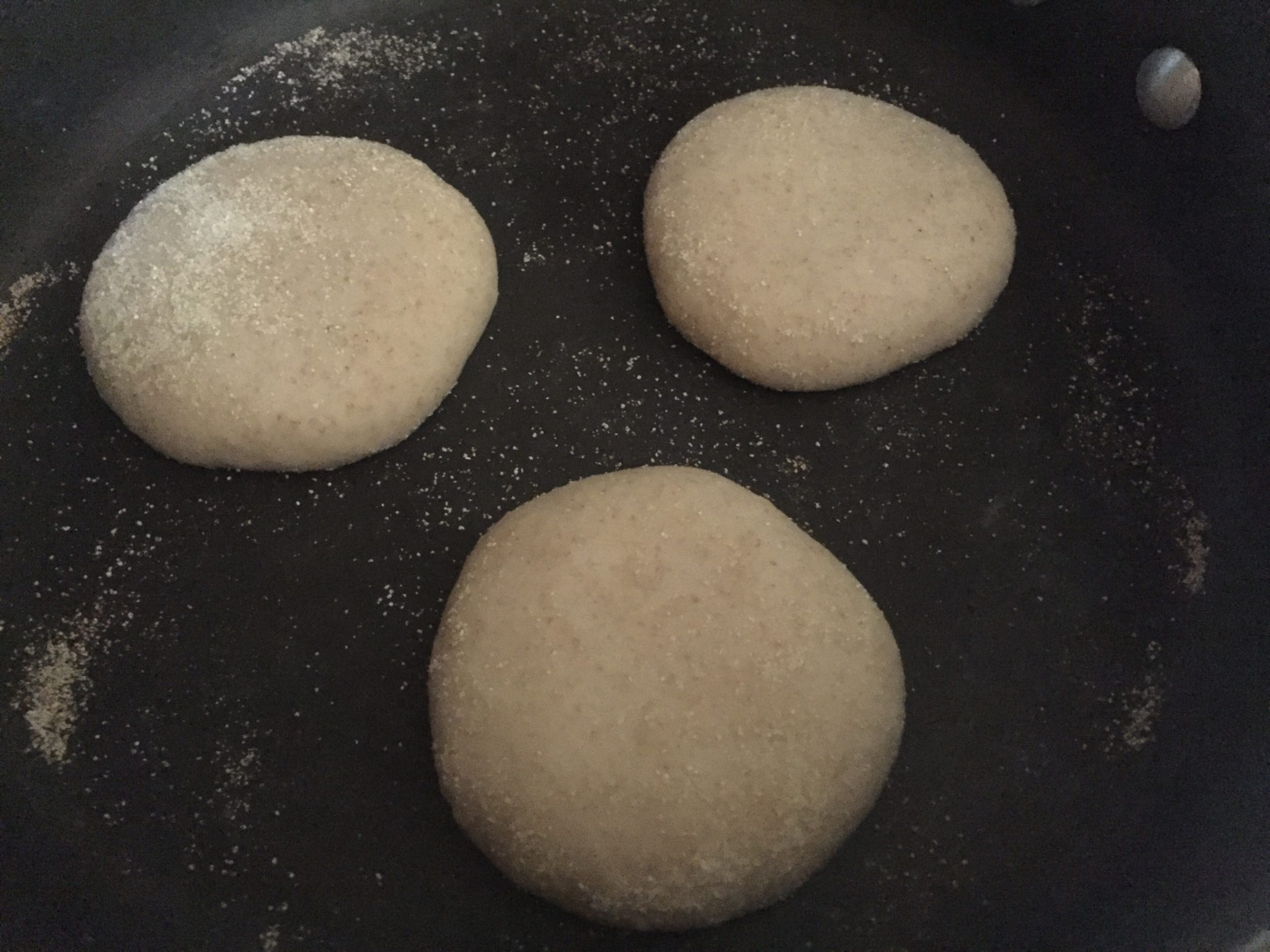 Cooking English muffins on a griddle