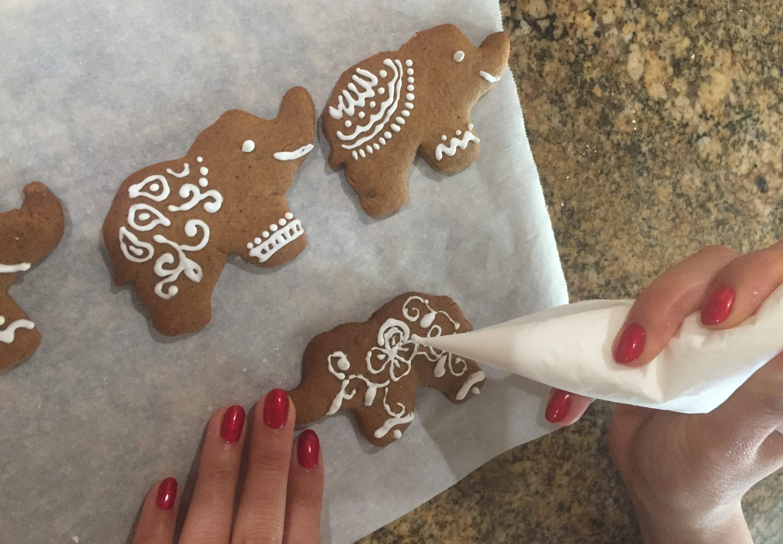 Decorate cookies with royal icing.