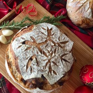 Savory Sourdough Holiday Bread made with sundried tomatoes, roasted garlic and rosemary