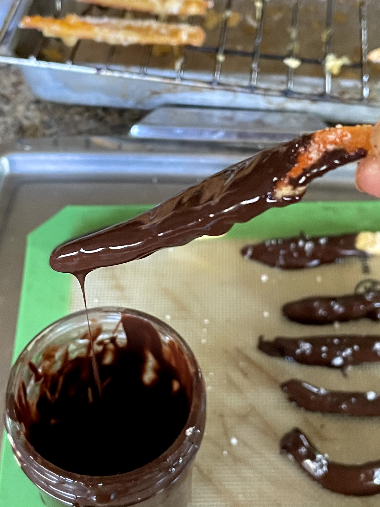 Dip sugar coated peel into dark chocolate and sprinkle with sea salt.