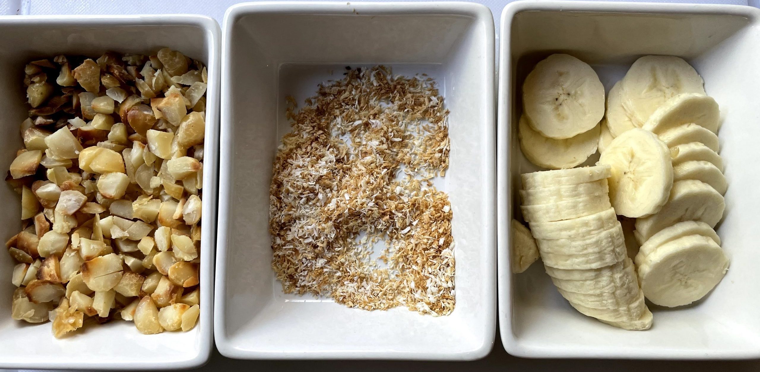 Sliced bananas, toasted mac nuts and coconut.