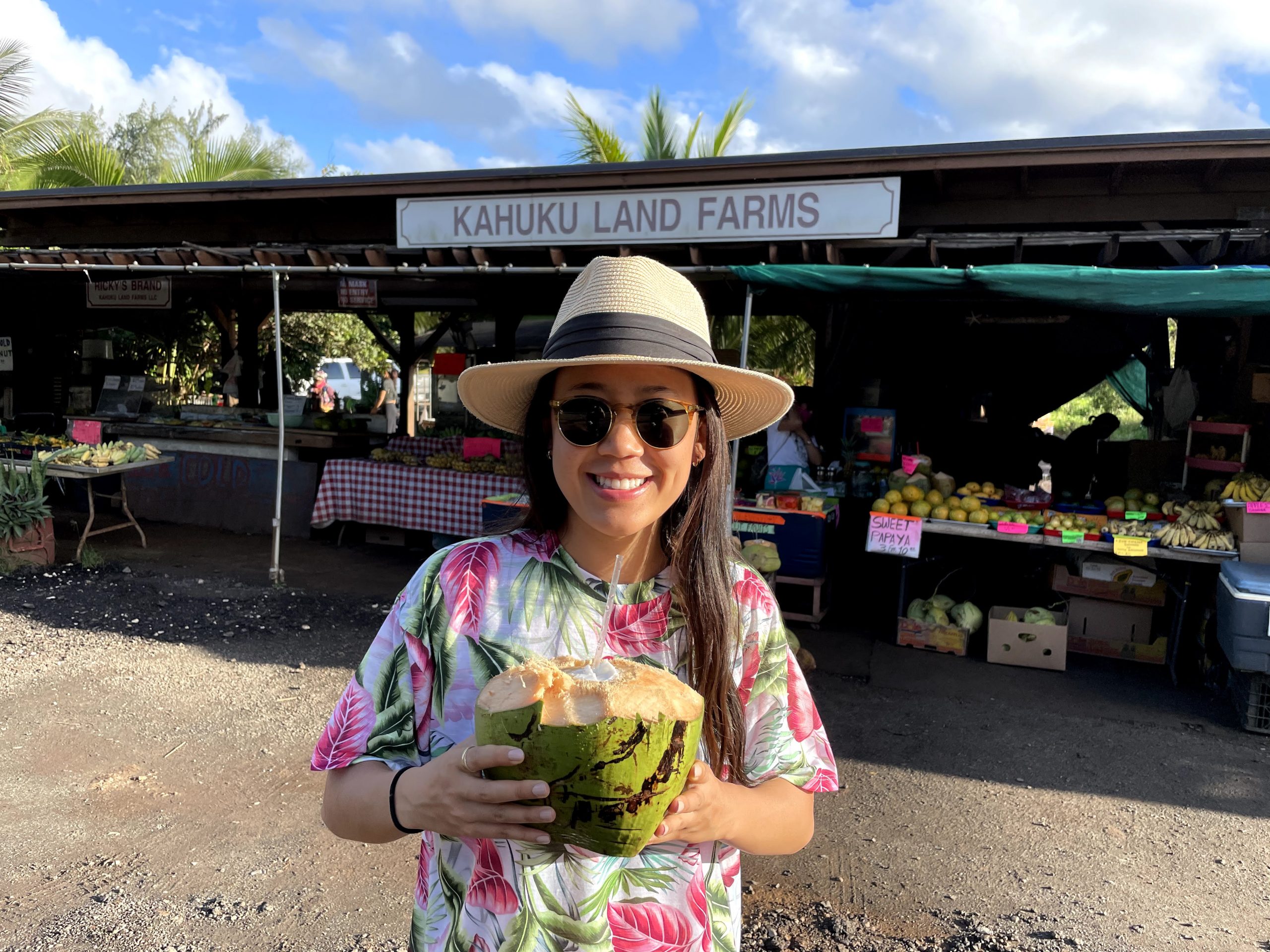 Drinking coconut water at a roadside stand