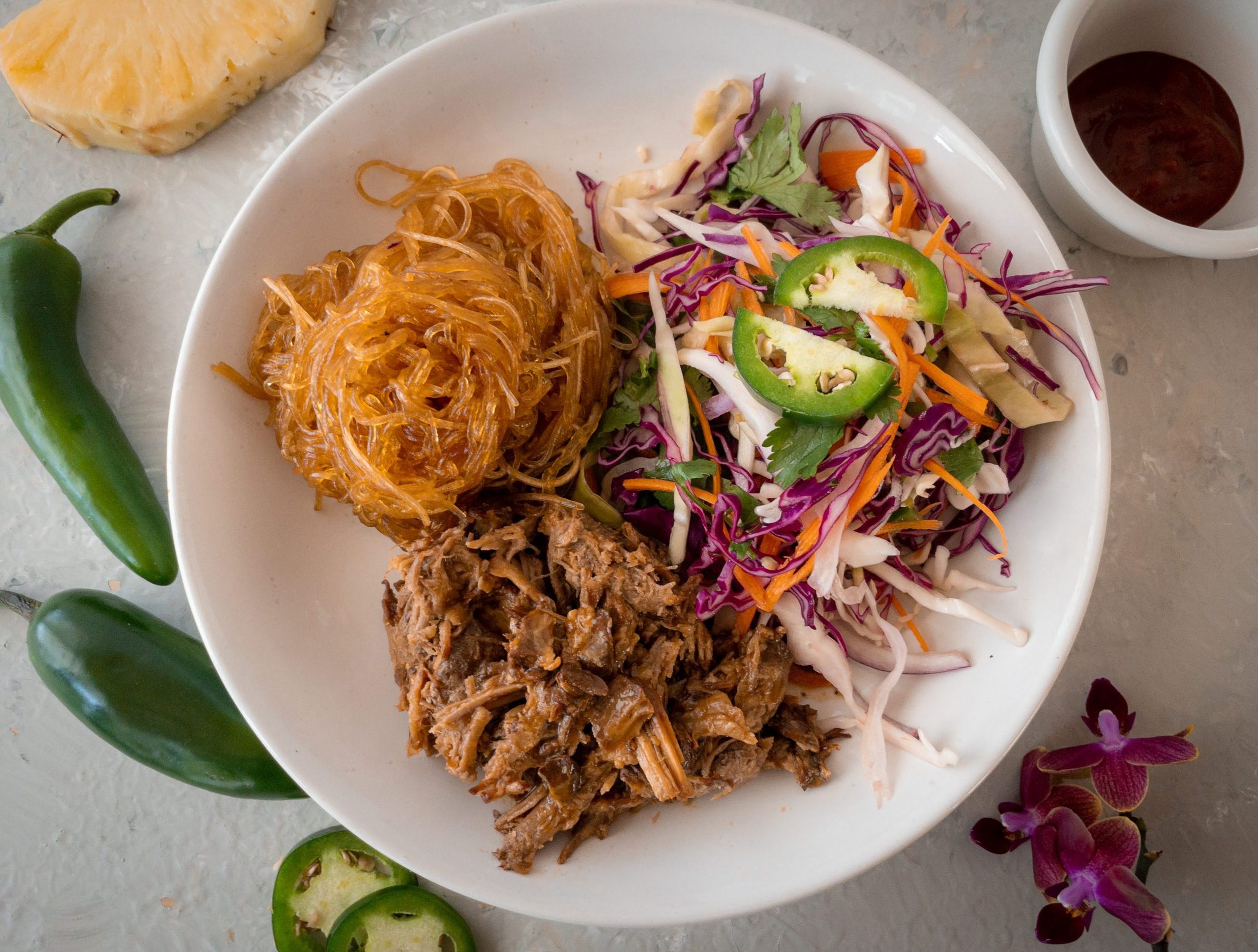 Hawaiin inspired mix plate with pulled pork.
