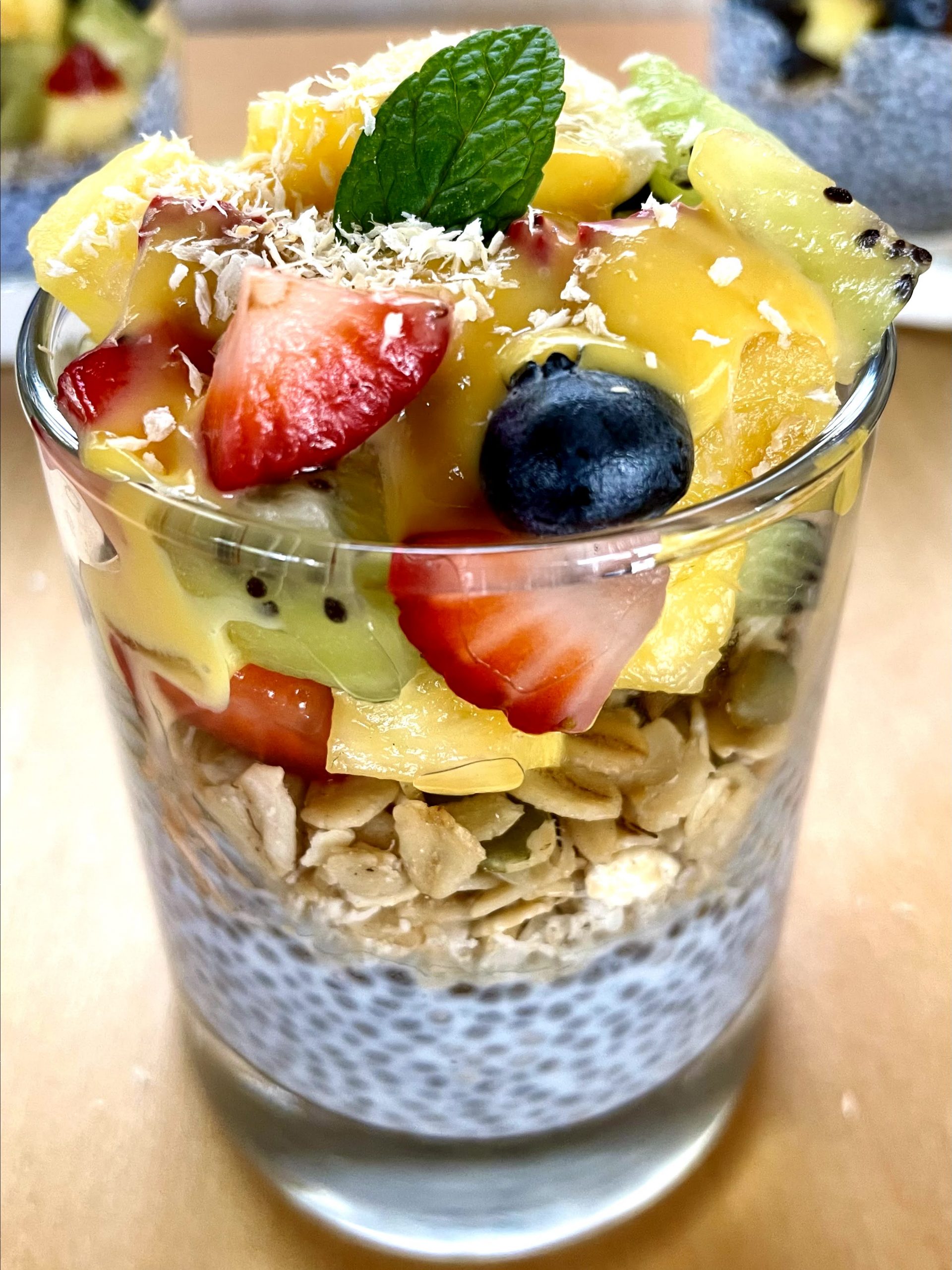 Sprinkle verrine with toasted coconut and mint for color.