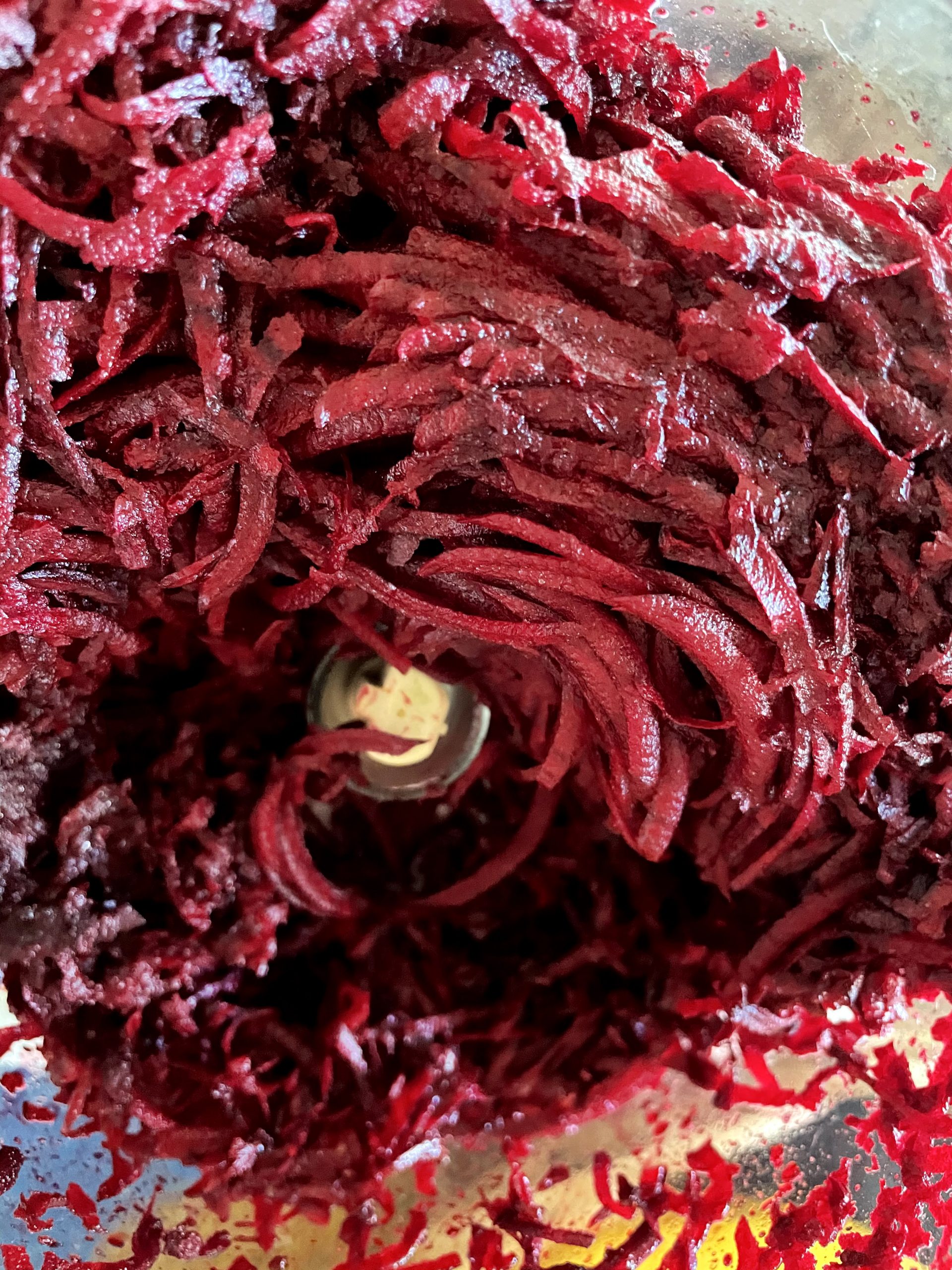 Use a grater or food processor to shred the beets.