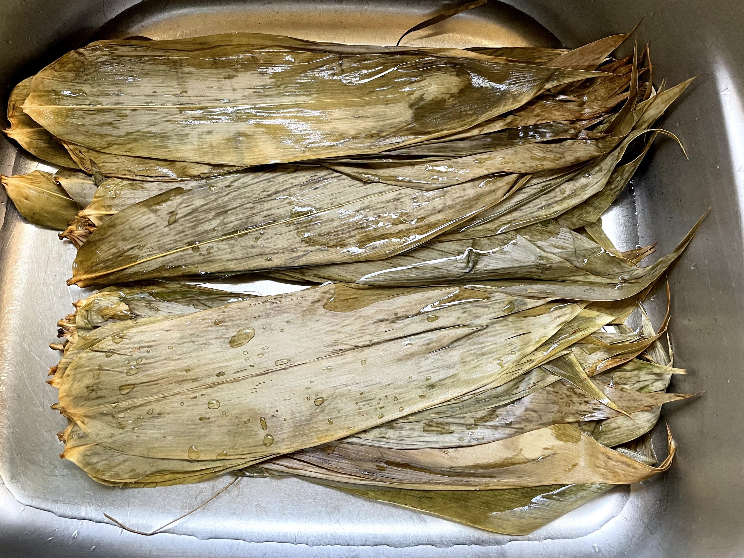 Clean and soak bamboo leaves overnight.