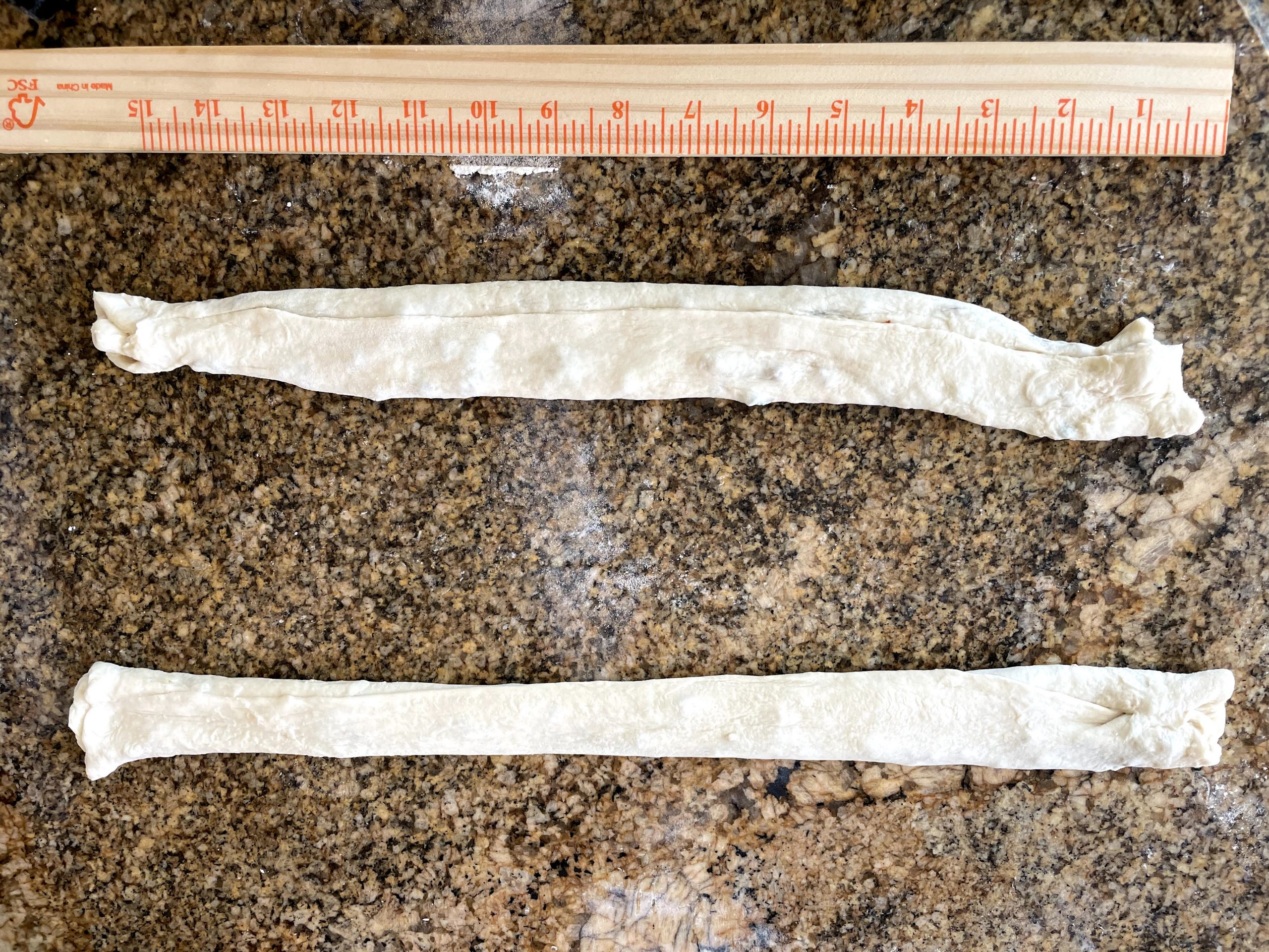 Stretch the dough to form a long snake.