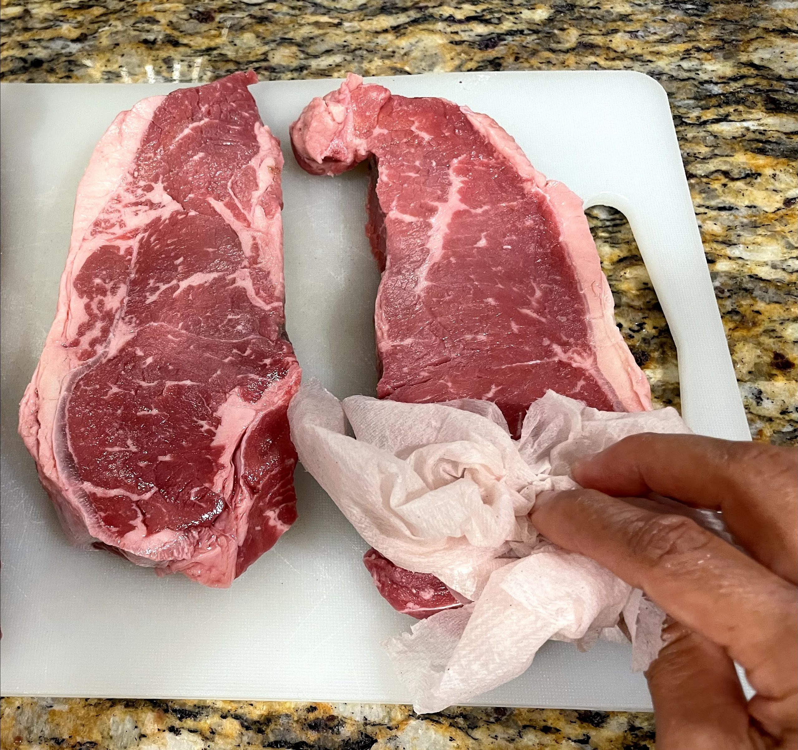Dry steaks thoroughly after washing.