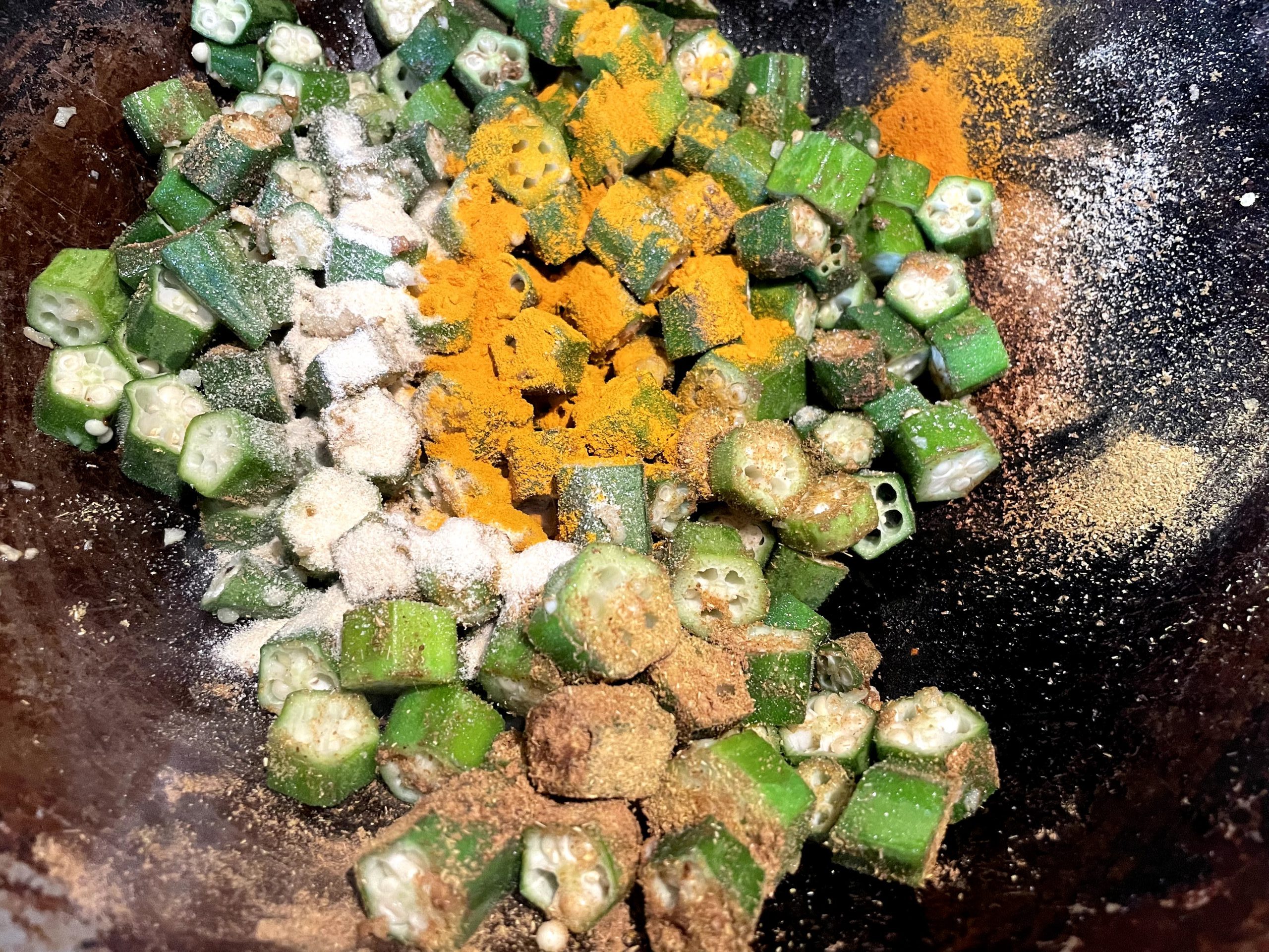 Adding spices to the okra helps absorb the okra juice.