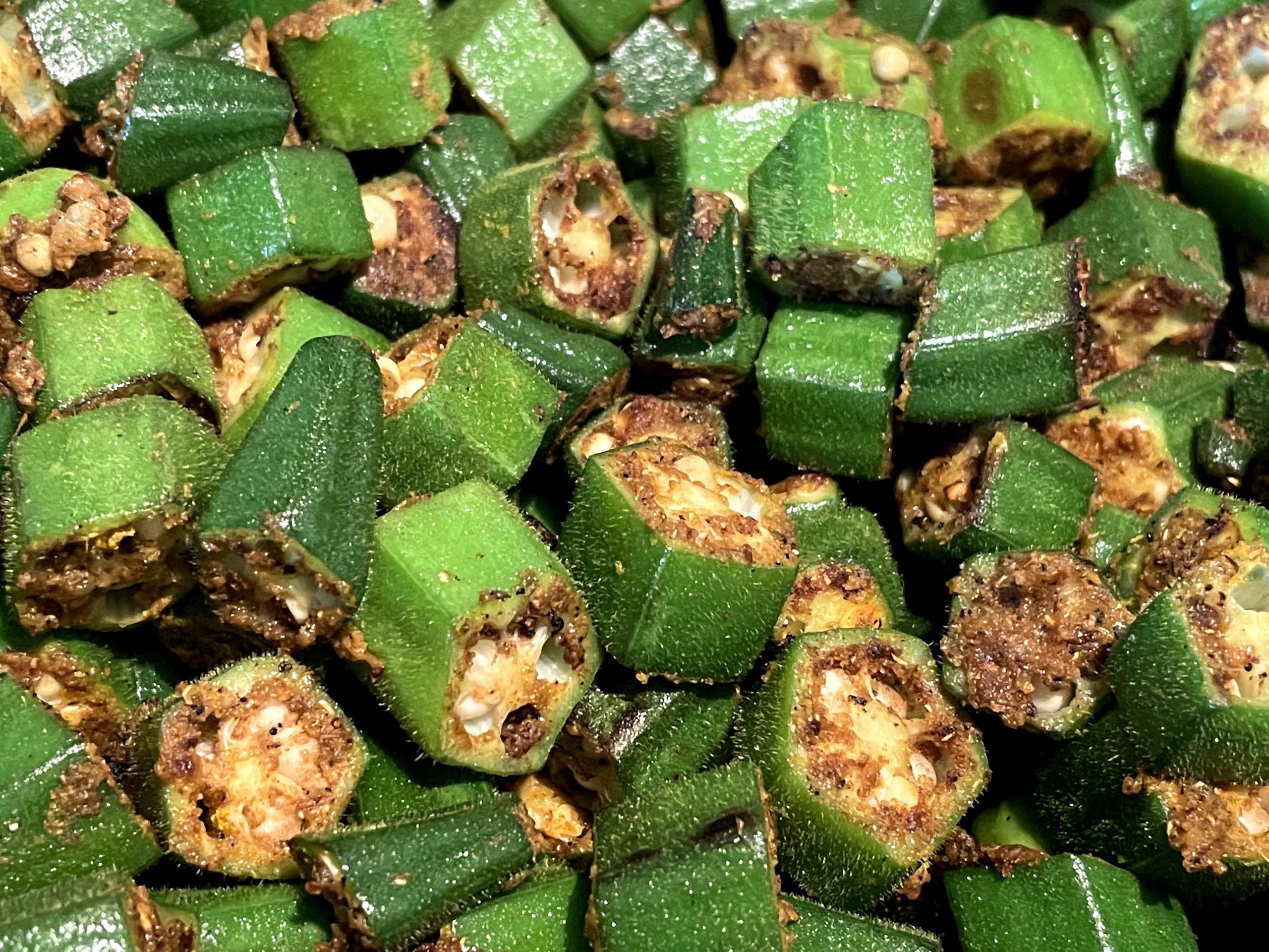 Cooking okra with spices.