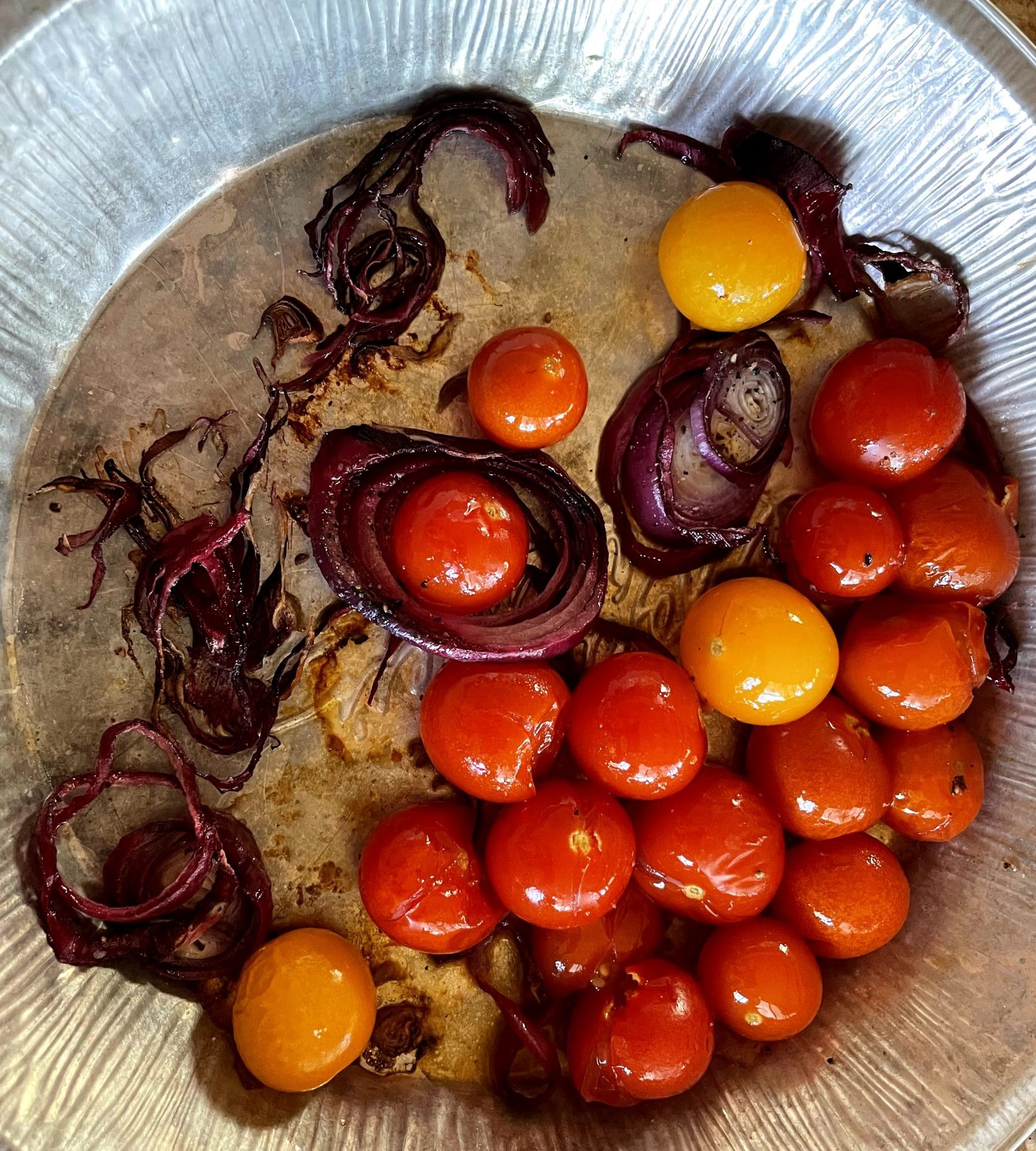 Roasted cherry tomatoes and onions