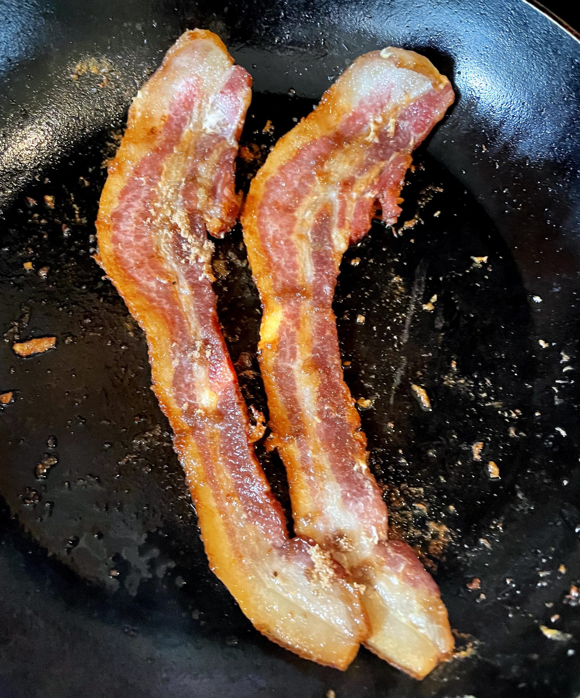Add maple syrup or brown sugar to almost cooked bacon