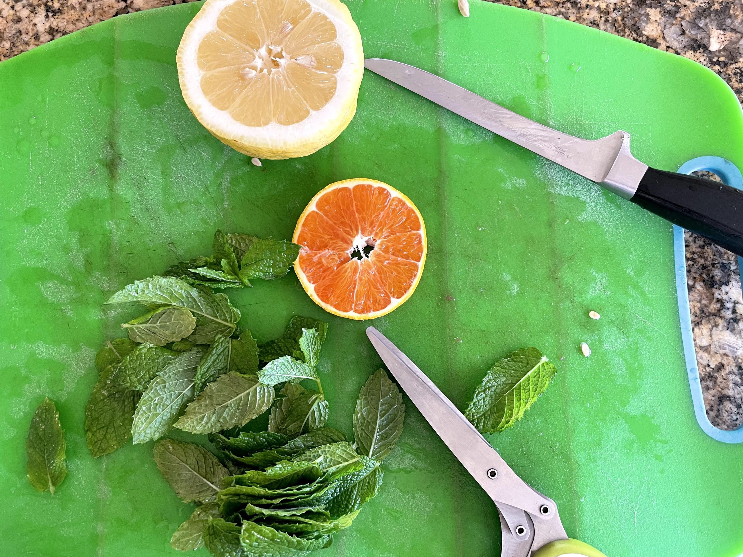 Chiffonade fresh mint and juice a fresh lemon and orange.