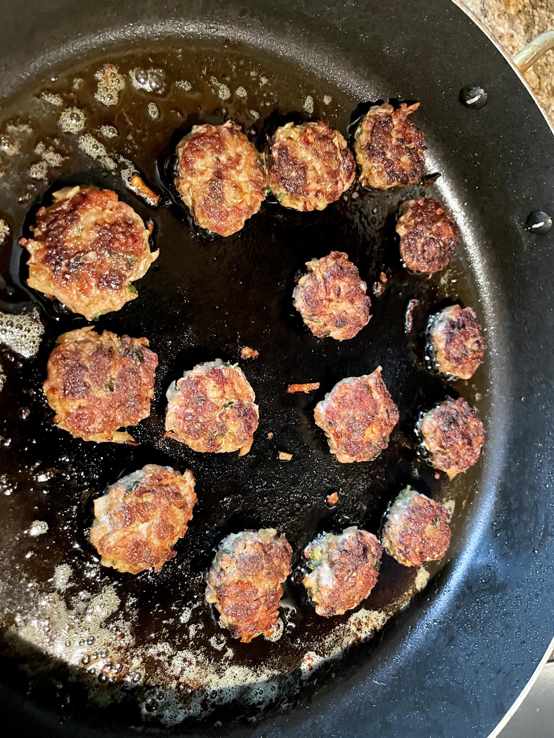Flatten meatballs to small bite-size cutlets.