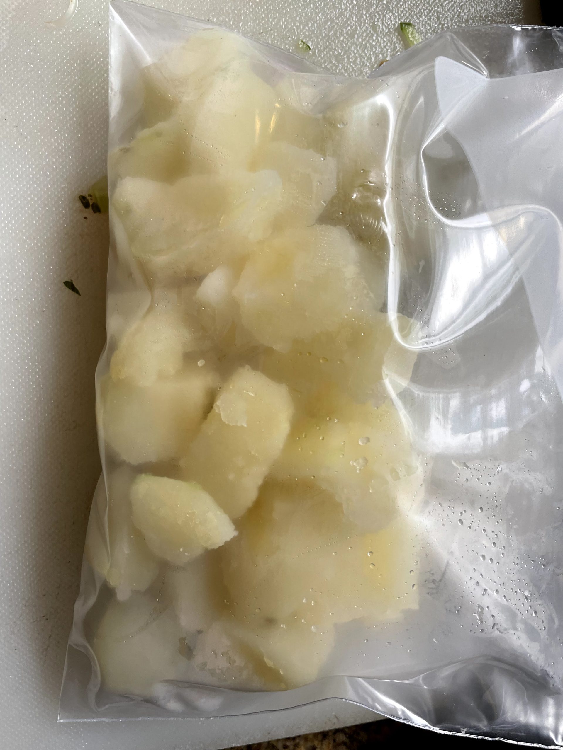 Place cooked potatoes in freezer bag.