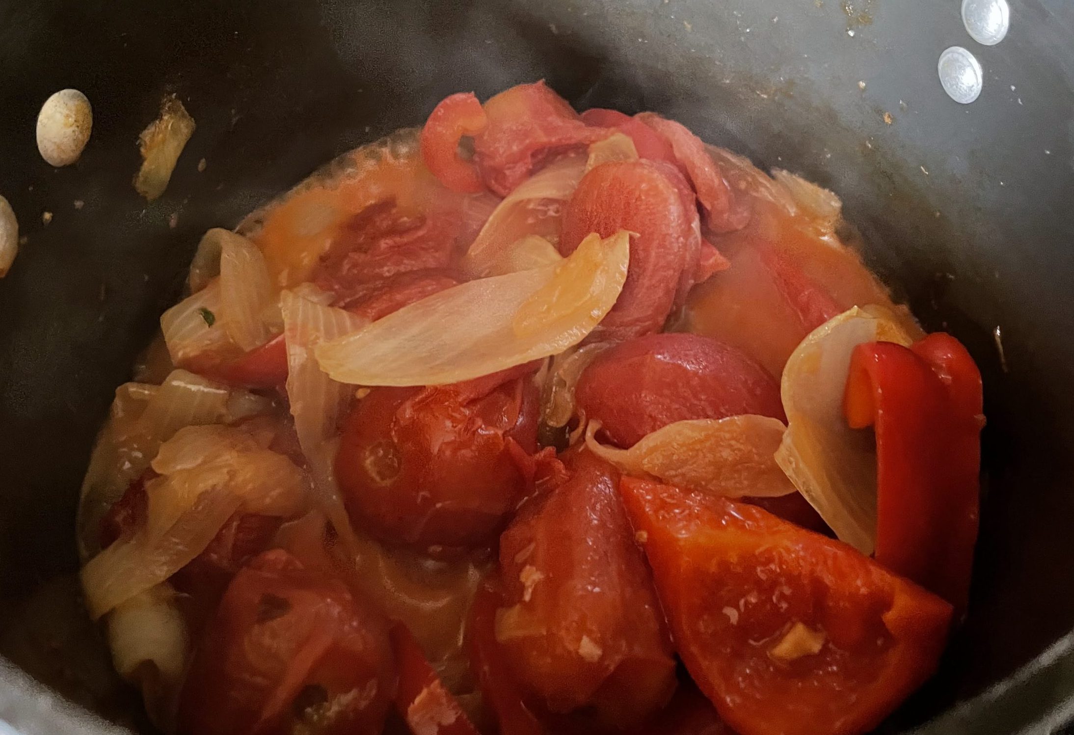 Garlic, onion, pepper and tomatoes sauteed until cooked.
