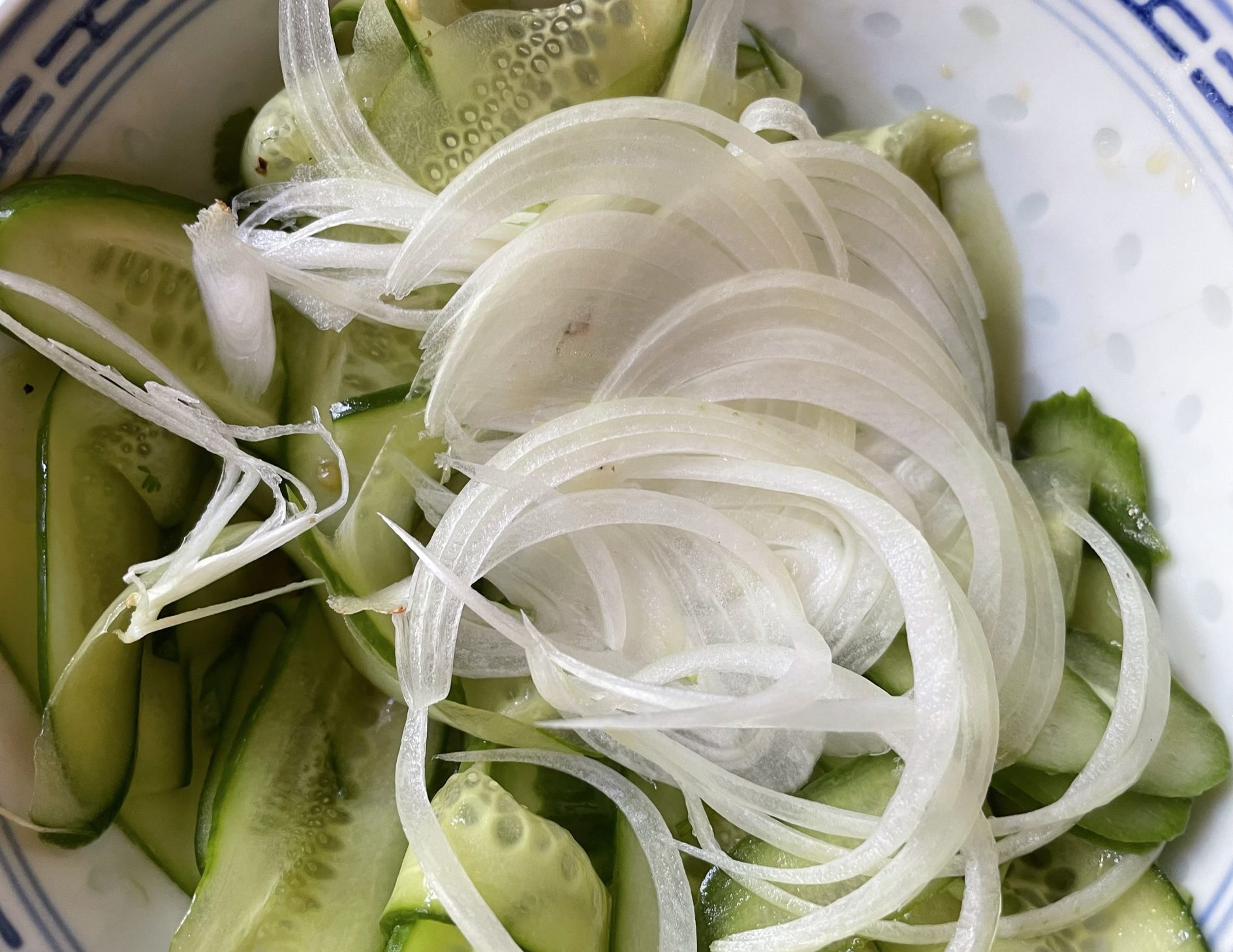 Thinly sliced onion and cucumber