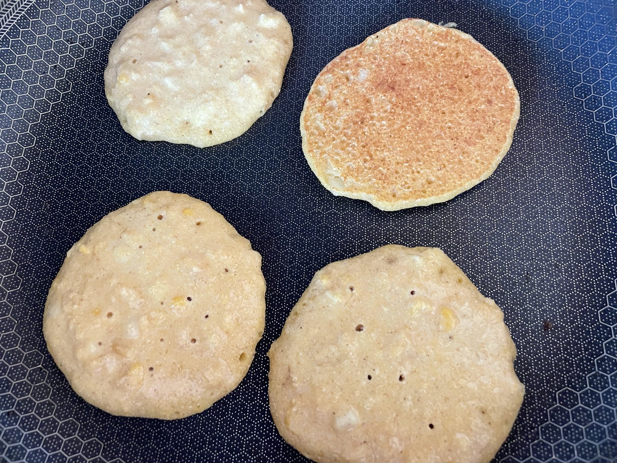 Flip pancakes when the sides appear cooked
