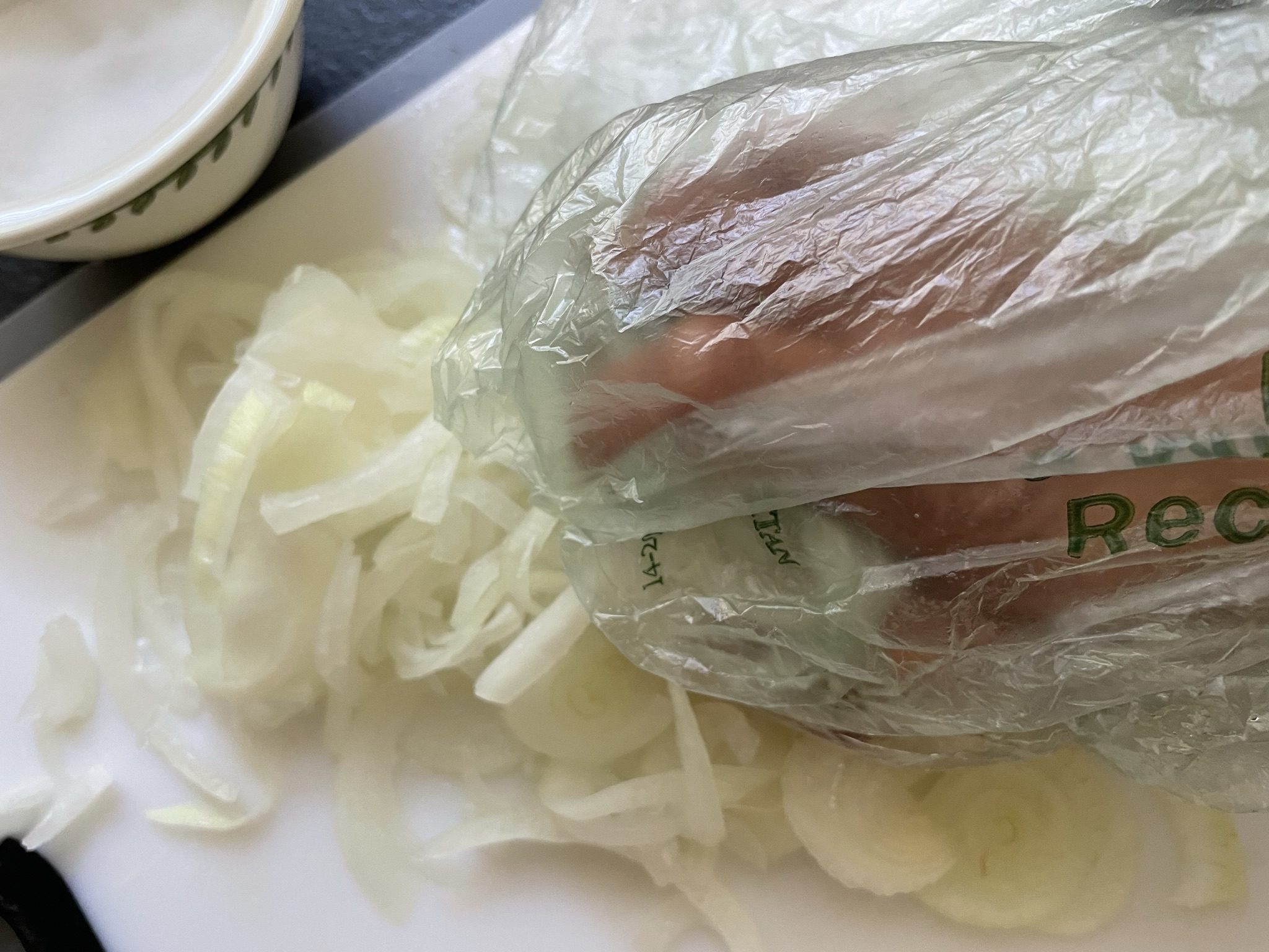 Squeeze the thinly sliced onion