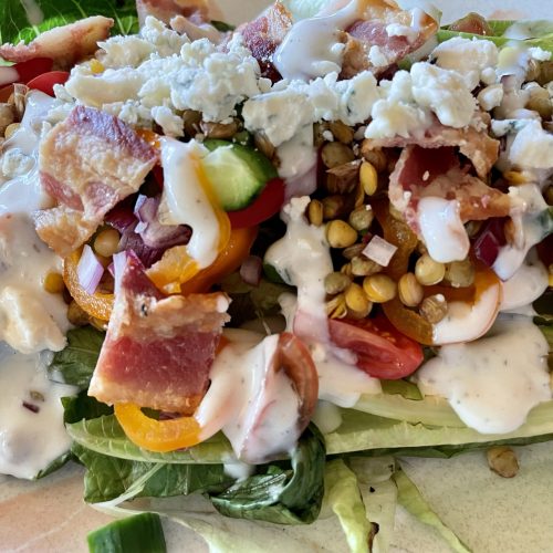 Grilled wedge salad with toppings