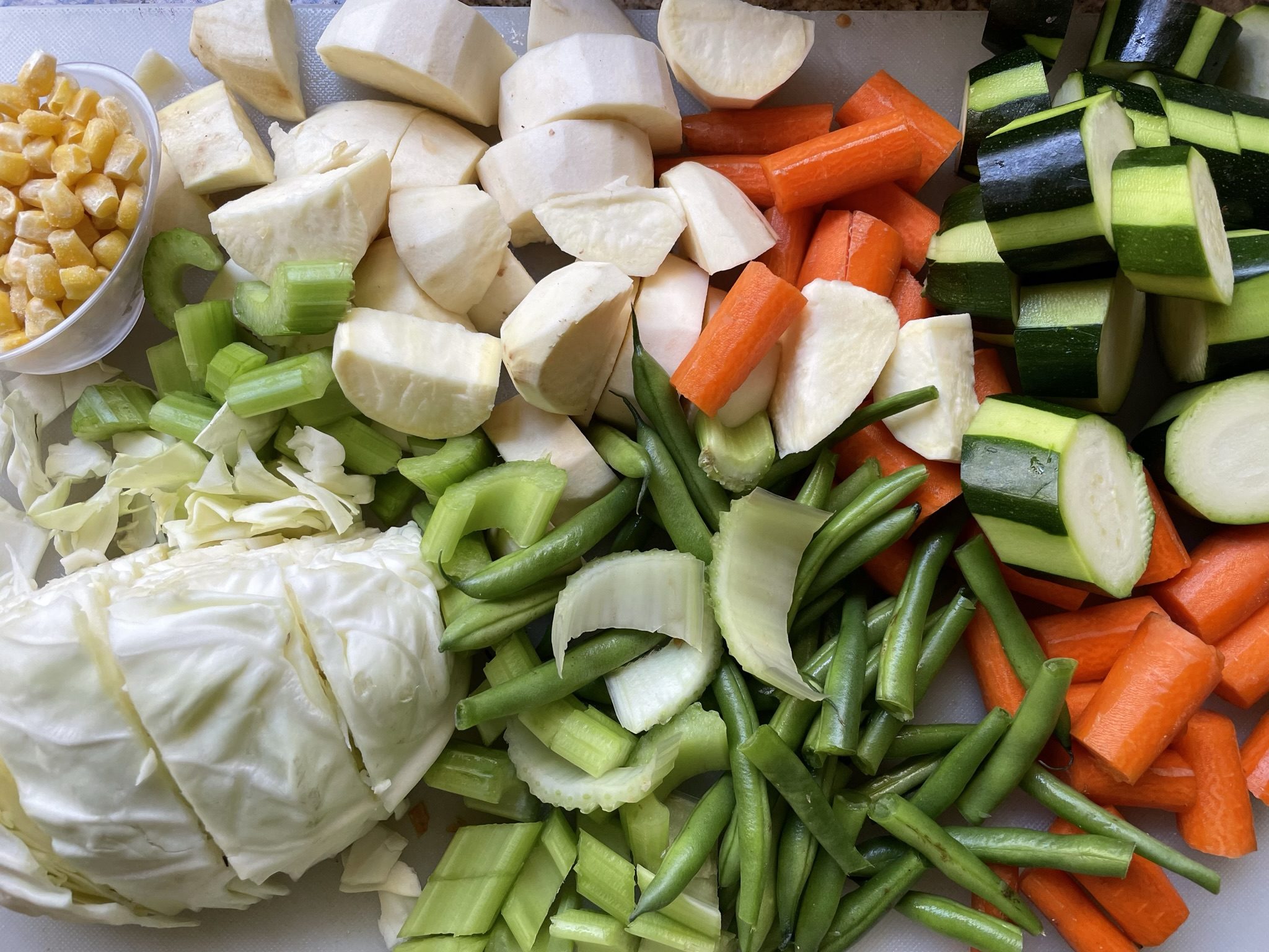 Cut vegetables for stew.