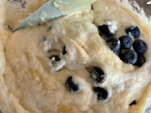 Fold in egg mixture and blueberries into the levain.
