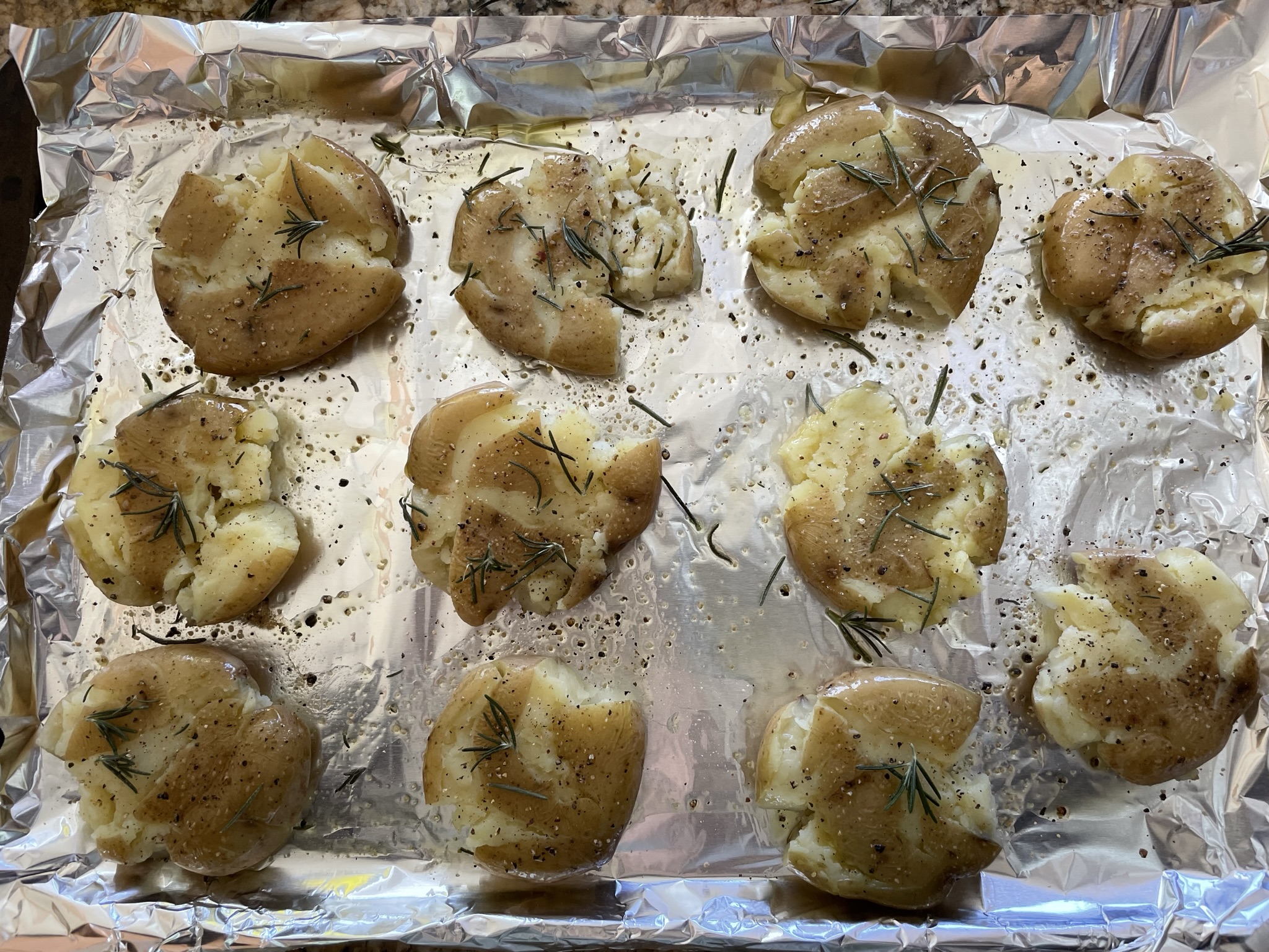 Smashed potatoes before broiling