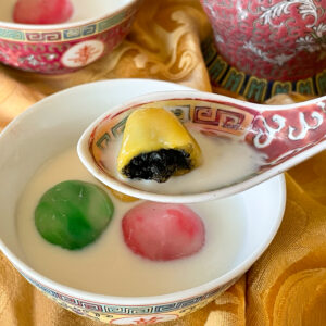 Glutinous rice balls with black sesame paste.